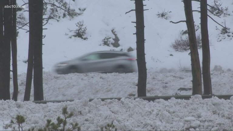 Snow falls over I-80 and Boreal Mountain outside Lake Tahoe, roads still icy