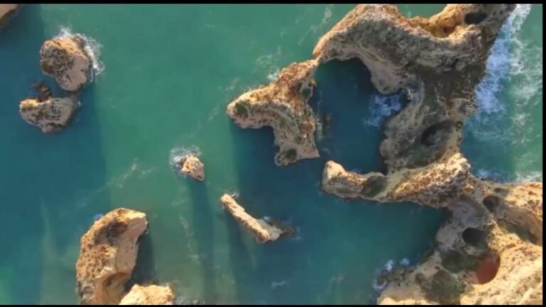 Aerial view of beautiful cliff formations in Lagos, Portugal 1