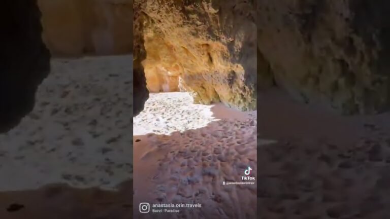 walking through the beach caves in Algarve Portugal #shorts #short  #viral #cave #beach #backpacking